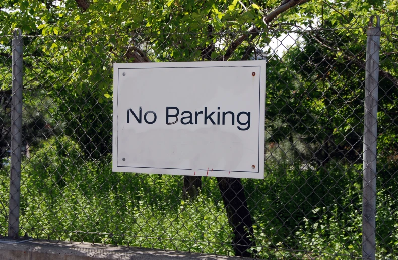 a sign is placed in a fenced off area