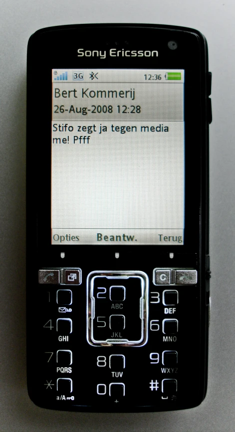 a cellphone displaying the message with a key pad