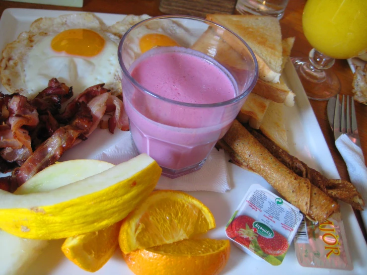 an image of some breakfast foods on the table