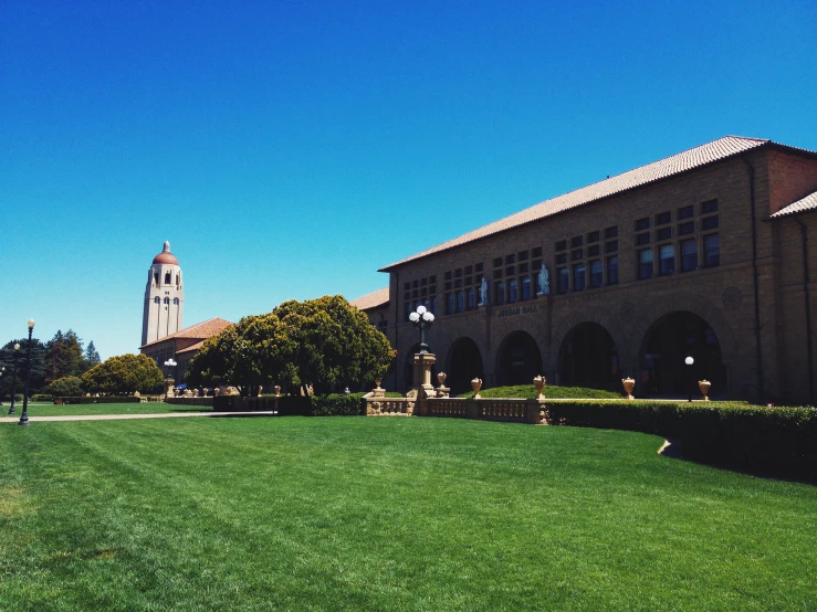 the building is in the middle of the lawn