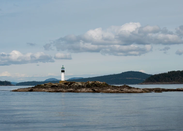 the small lighthouse is located on an island