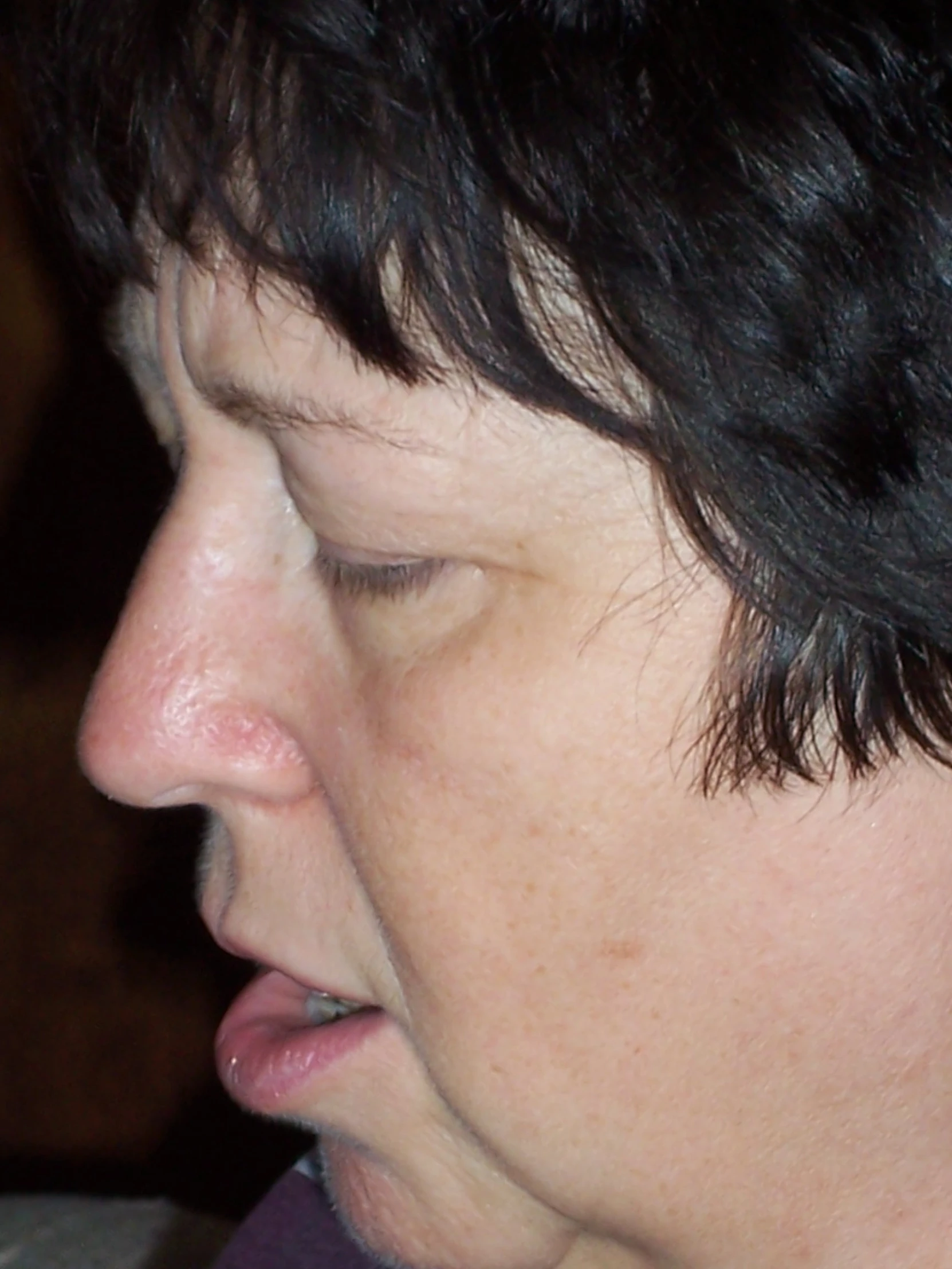 a close up view of a person with his nose open