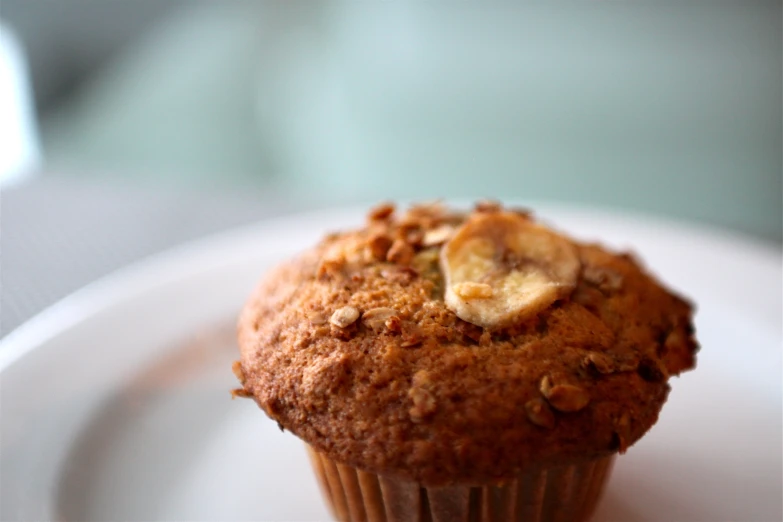 a close up of a cupcake on a plate