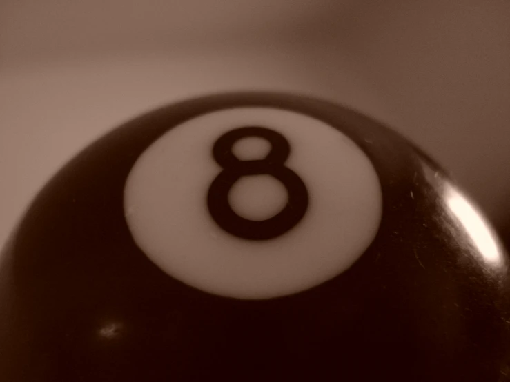 a pool ball with the number eight on it