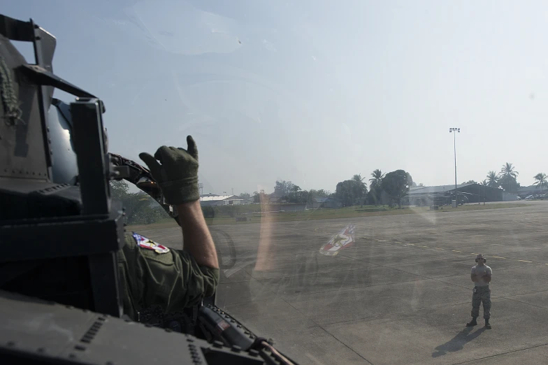 an army plane is shown as it approaches the airport