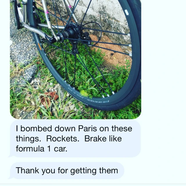 a text message from a bicycle rider and his bike wheel
