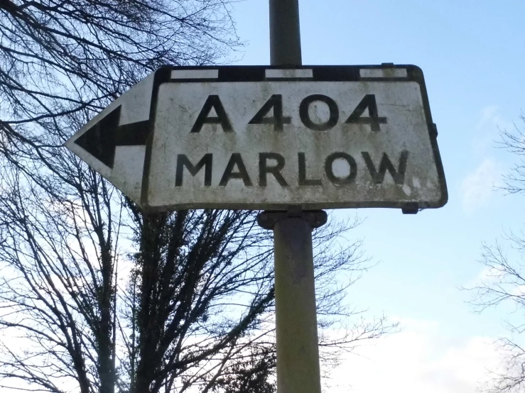 a white sign that has been modified to say ao4a marion