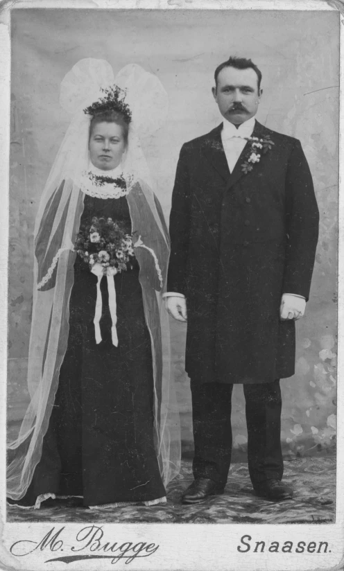 a couple is in a wedding portrait for an old po