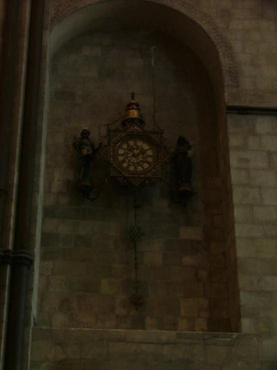 a large clock mounted on the wall of a building