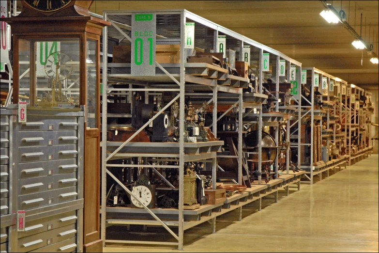 a room filled with shelves filled with clocks and clock boxes