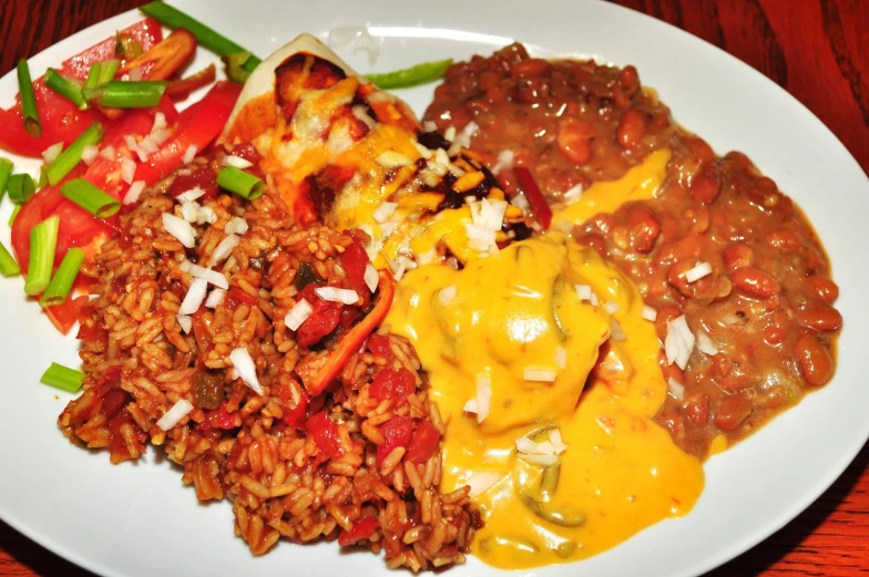 a plate of food sits on a wood table