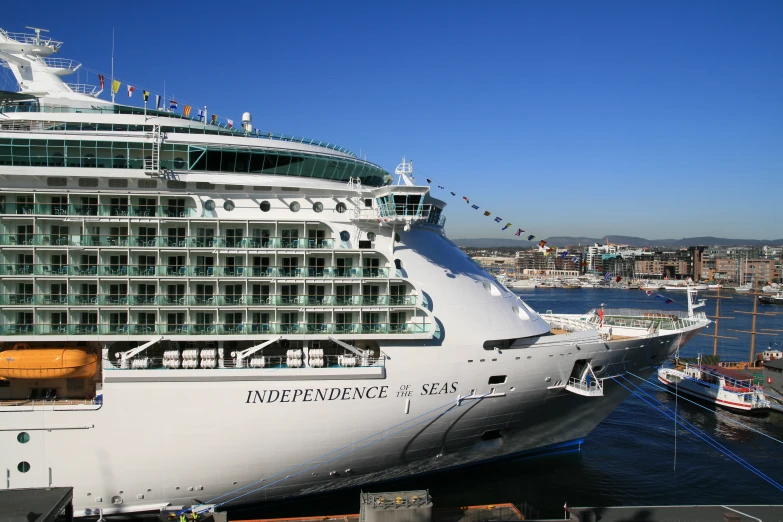 a very large cruise ship that is in a harbor