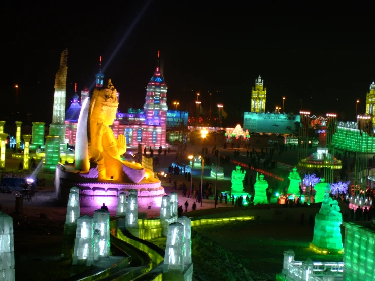 a city skyline with lights in the night