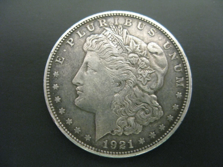 the first coin was in mint condition, but had been silver