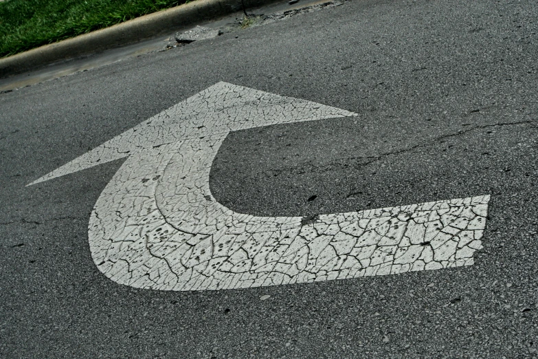 this is a street sign painted on the pavement