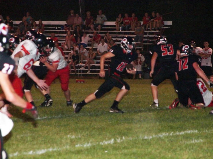 the game is on as players are running down the field