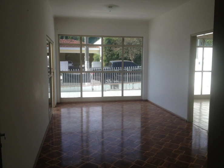 empty room with sliding glass doors leading to driveway