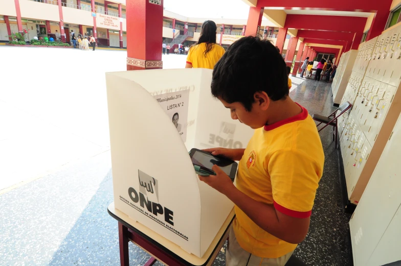 boy using a mobile device for information at an event