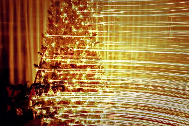 a christmas tree made out of lights on a table