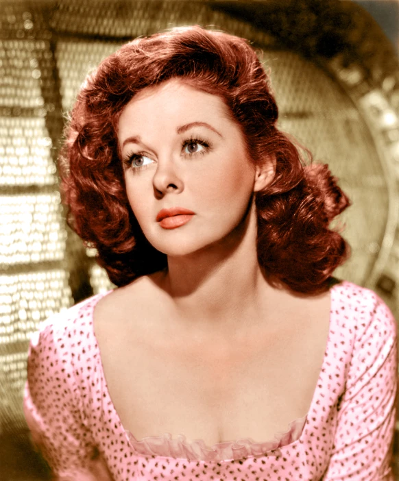 a black and white po of a woman with red hair