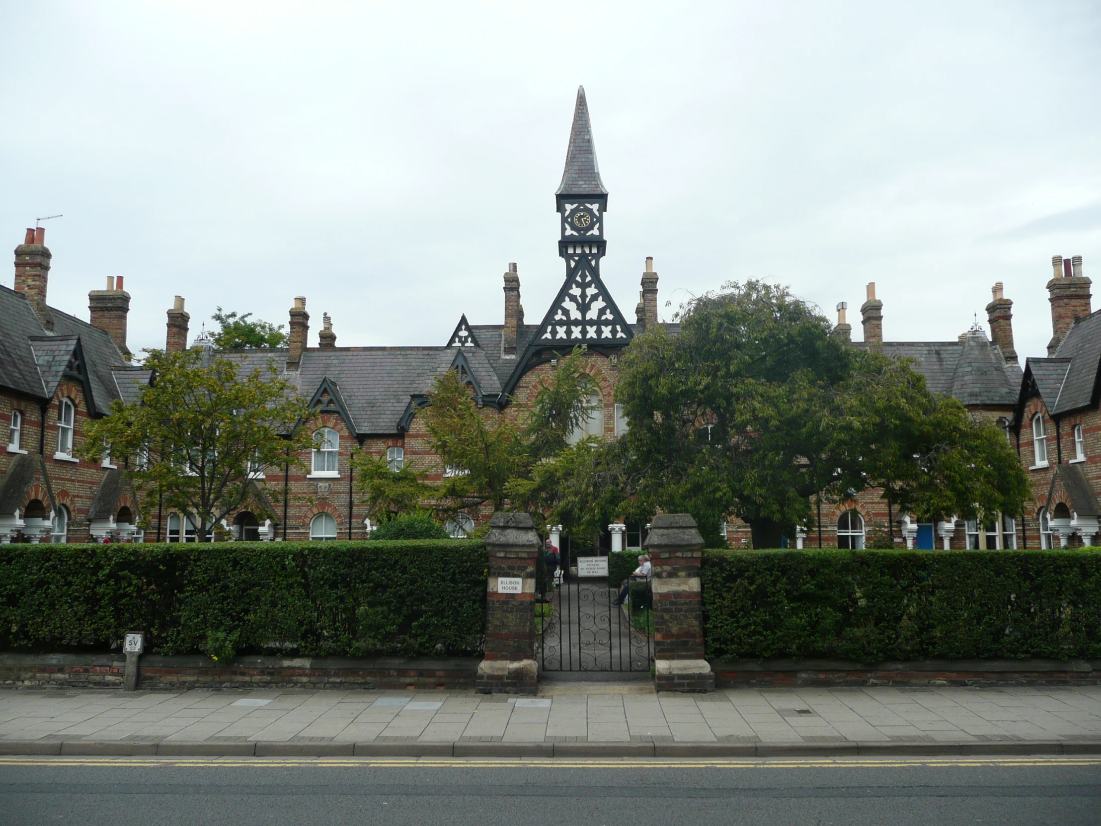 the building with a clock tower has two clocks on it