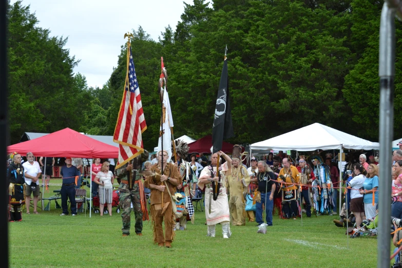 a group of people dressed up as american flags