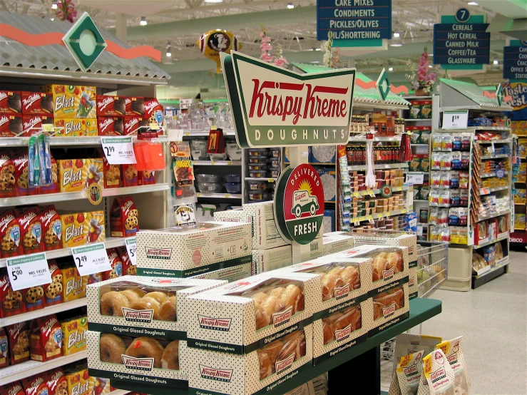 this store has many bagels and bread in the racks