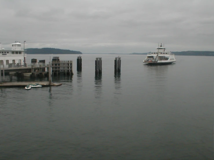 two ships in the water off the dock