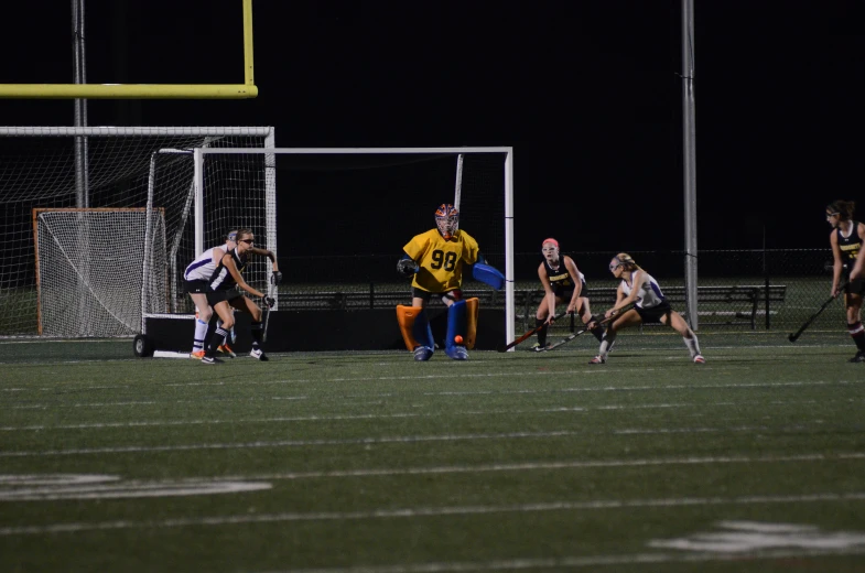 a group of players in action on the field