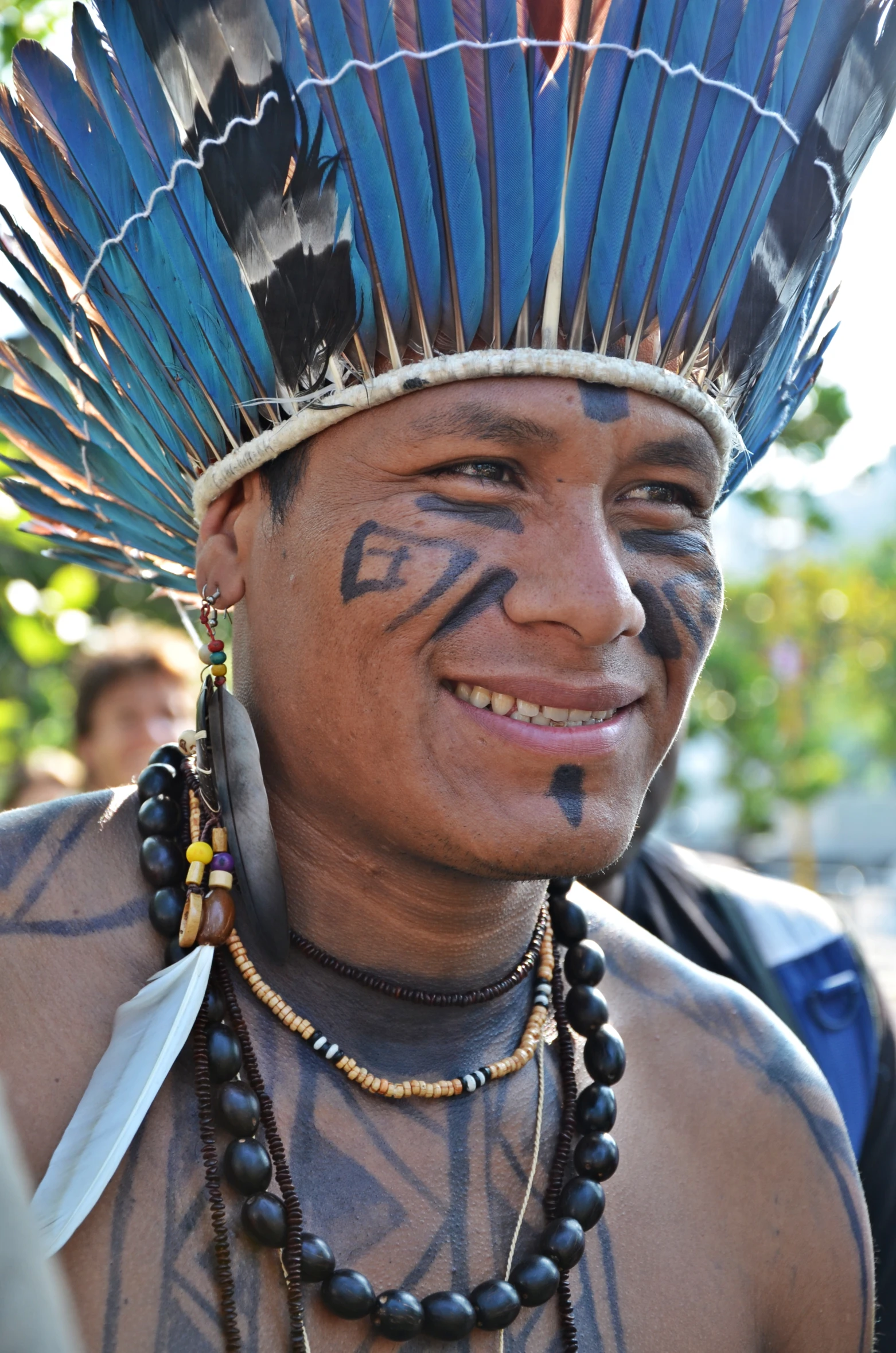 a man wearing a native american feather headdress