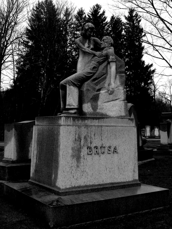 a statue of a girl holding a rose in her hand