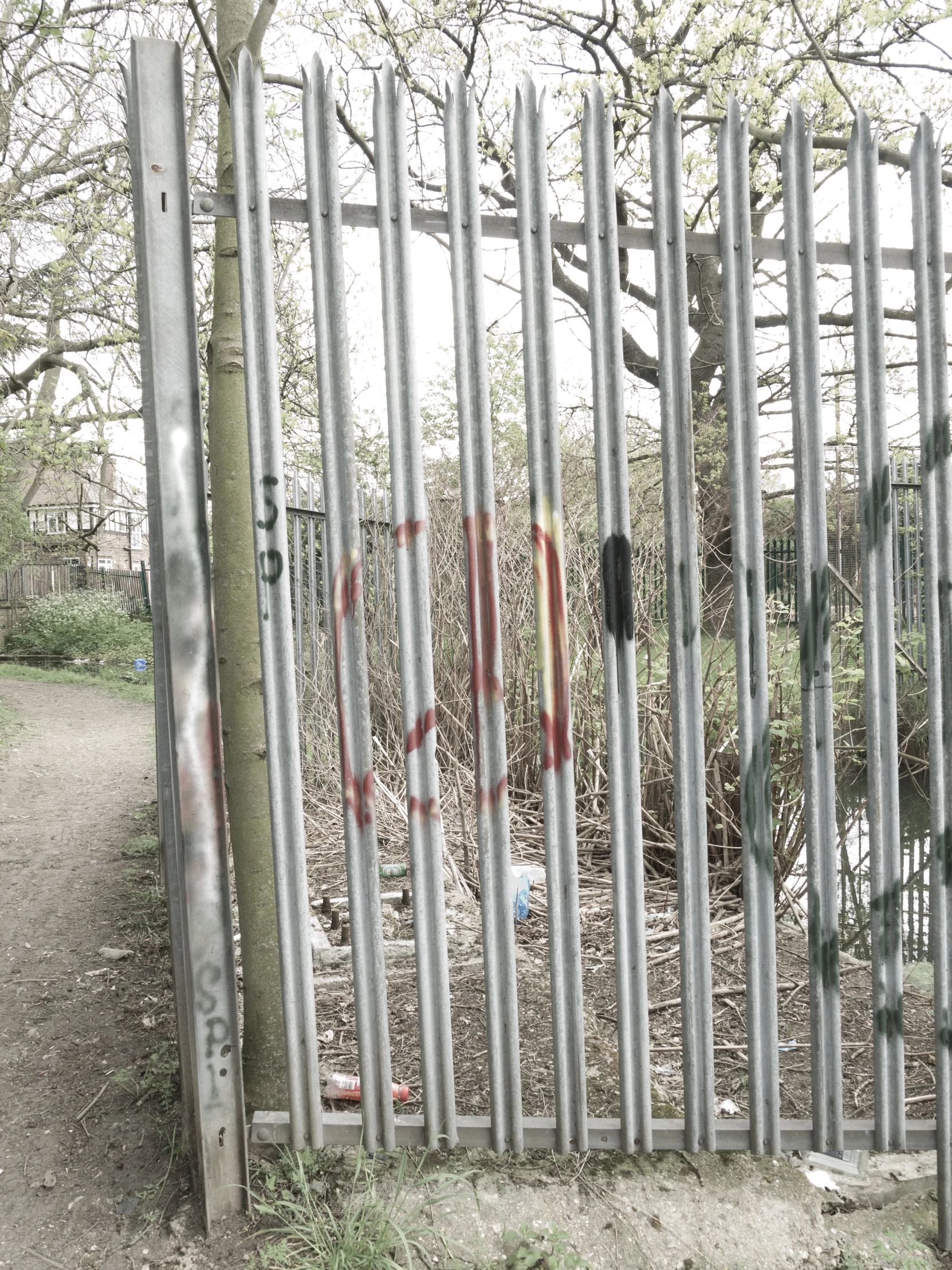 a fence with some writing on it