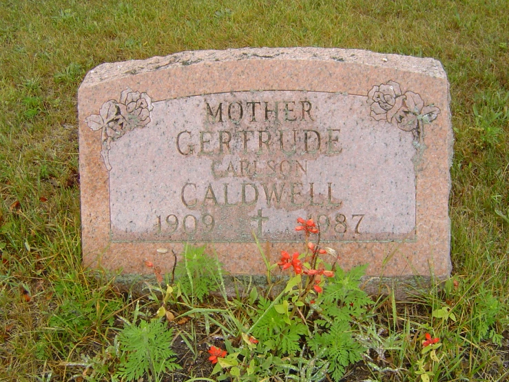 the headstone of caudwell and betty, the parents of two children