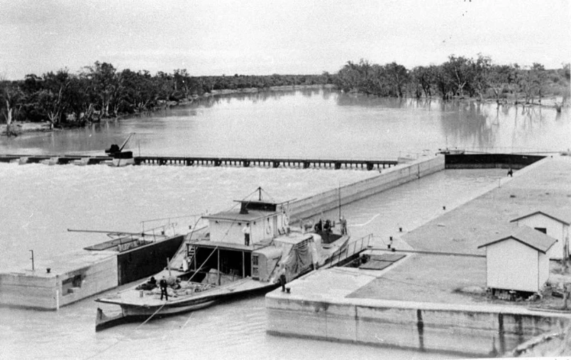 a large boat going into a locksed in lock