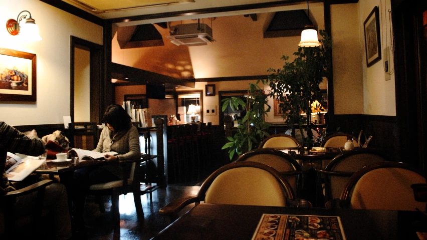 a restaurant interior with a bunch of tables and chairs