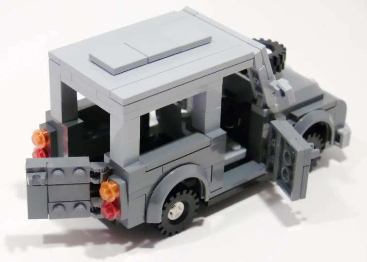 a lego truck with lots of windows on the back