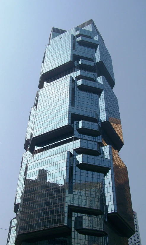 a skyscr with many glass windows in the city