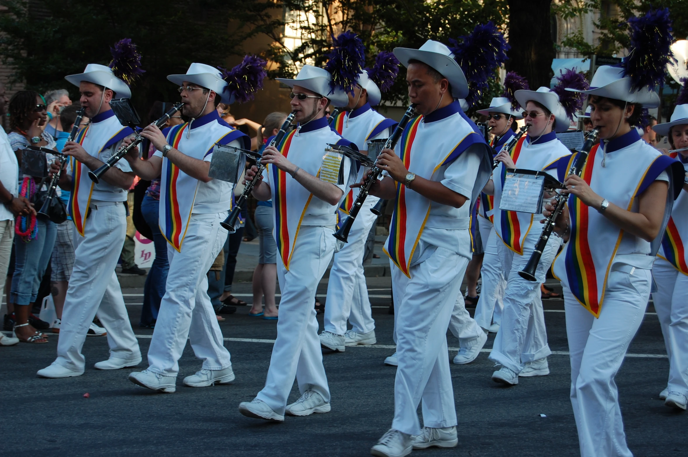 a band with a male and female band in the back