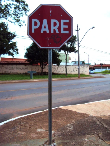 a stop sign has graffiti written on it