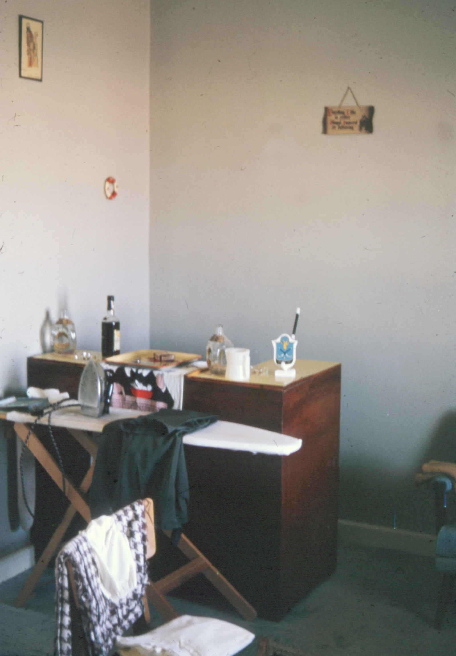 a room that has a small wooden desk