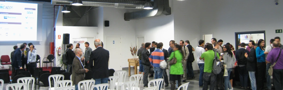 group of people in the middle of an auditorium