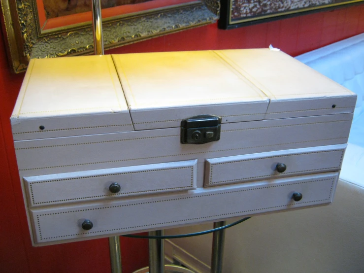 an old white chest is shown in this po
