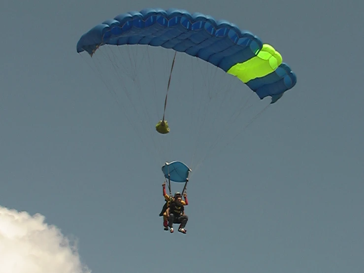 a person is para sailing on top of a cloud