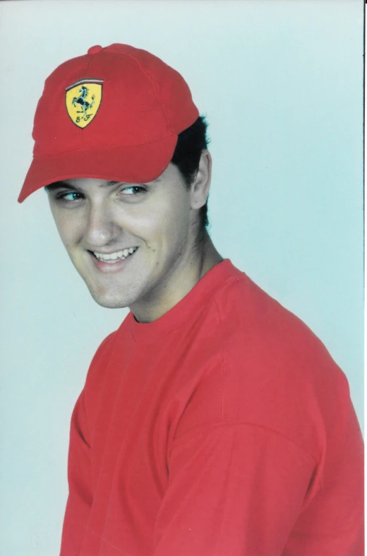 a man in a red cap and red shirt