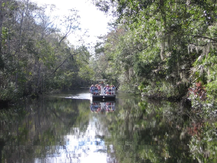 the two boats are traveling through the river