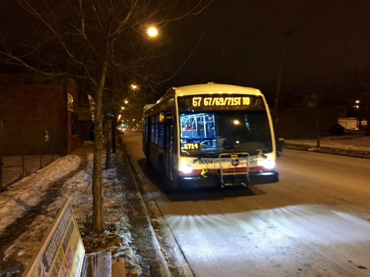 a bus is stopped to pick up passengers