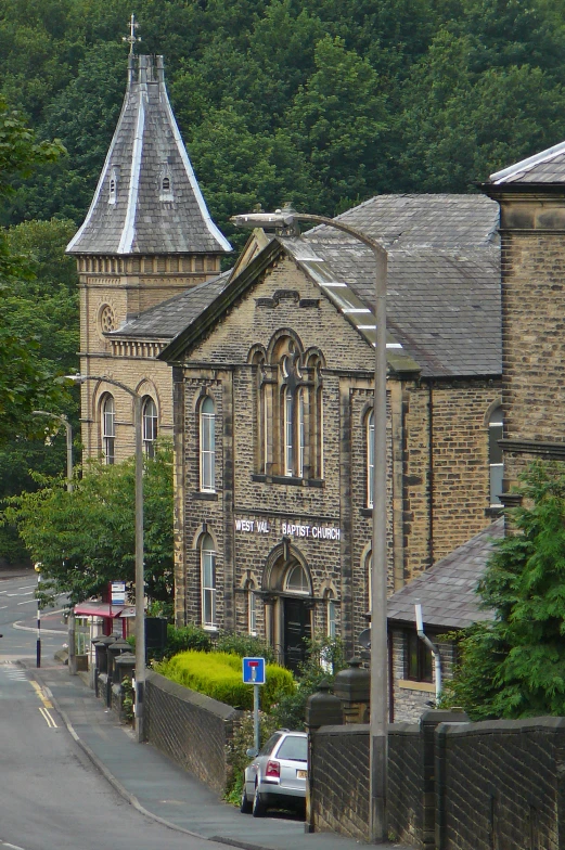 a small church sits on a street corner