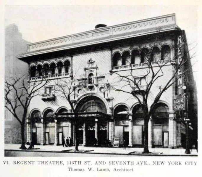 an old building is standing on the corner of the street