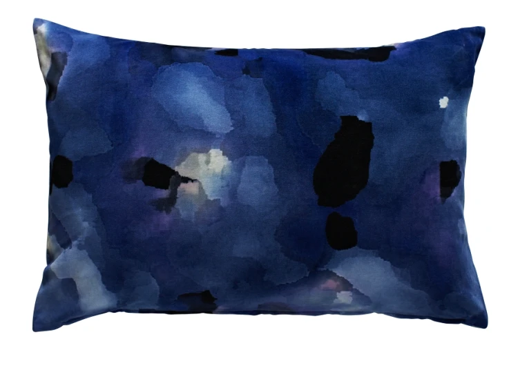 a watercolor pillow in the form of flowers and stars