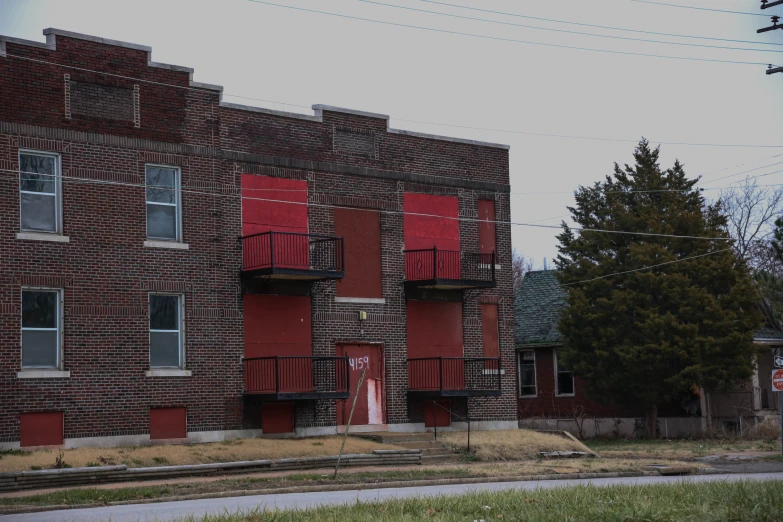 a building with a bunch of windows and balconies